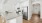 a kitchen with white cabinets