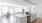 a kitchen with white cabinets